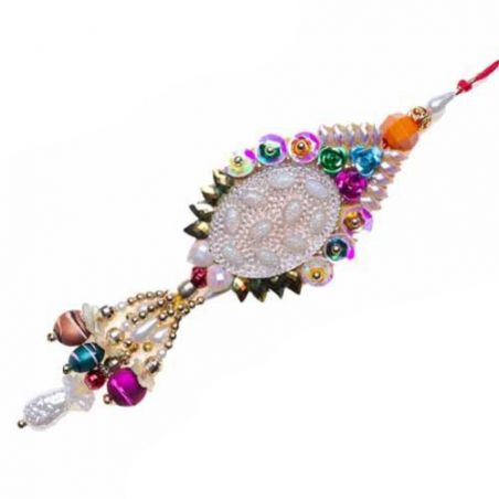 Diamond And Pearls With Velvet Ball Fancy Rakhi