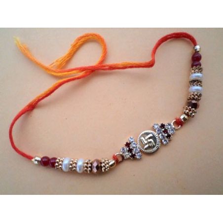 Swastik Rakhi with decorative pearls