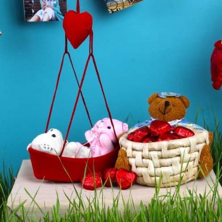 Couple Teddies Love Boat with Heart Shape Chocolates Basket