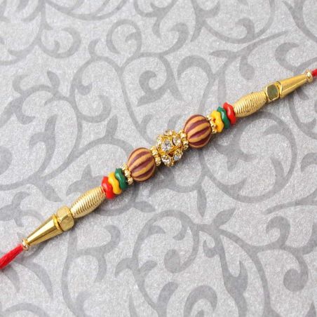 Golden Design with Diamond Studded Rakhi