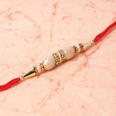 Ellipse Shape Pearl Rakhi