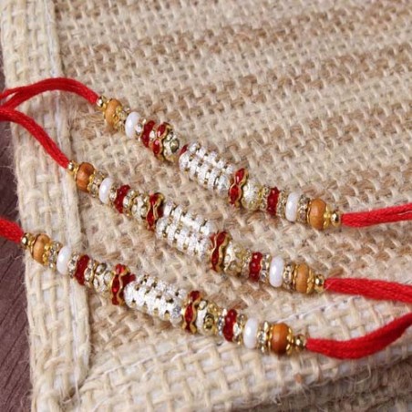 Marvellous Shiny Triple Rakhi Set