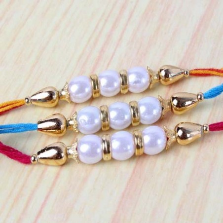 Striking Three Golden Pearl Rakhi