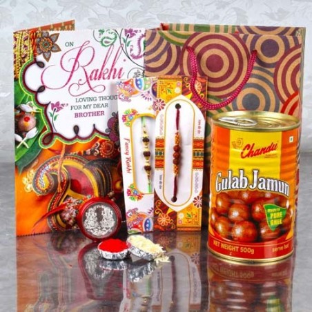 Gift Bag of Two Rakhis and Gulab Jamun with Laxmi GaneshaCoin and Card