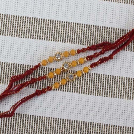 Single Diamond Dial with Beads Three Rakhi Set